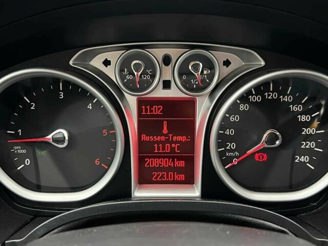 Червоний Форд Фокус, об'ємом двигуна 1.6 л та пробігом 209 тис. км за 6500 $, фото 11 на Automoto.ua