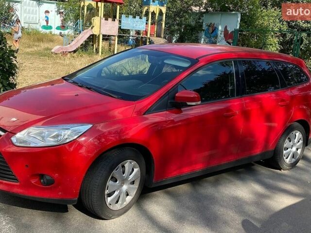 Красный Форд Фокус, объемом двигателя 1.6 л и пробегом 260 тыс. км за 6000 $, фото 1 на Automoto.ua