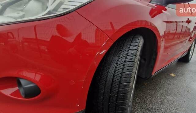 Червоний Форд Фокус, об'ємом двигуна 1.6 л та пробігом 212 тис. км за 6700 $, фото 11 на Automoto.ua