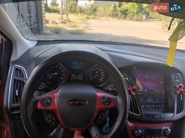 Красный Форд Фокус, объемом двигателя 1.6 л и пробегом 155 тыс. км за 8700 $, фото 12 на Automoto.ua
