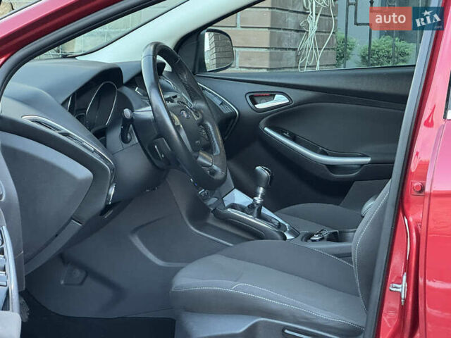 Червоний Форд Фокус, об'ємом двигуна 1.6 л та пробігом 259 тис. км за 7250 $, фото 94 на Automoto.ua