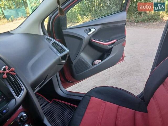 Красный Форд Фокус, объемом двигателя 1.6 л и пробегом 155 тыс. км за 8700 $, фото 18 на Automoto.ua