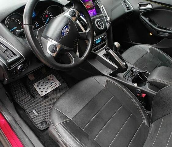 Червоний Форд Фокус, об'ємом двигуна 1.6 л та пробігом 26 тис. км за 13000 $, фото 6 на Automoto.ua