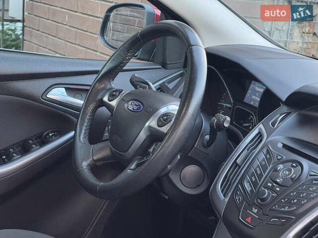 Червоний Форд Фокус, об'ємом двигуна 1.6 л та пробігом 259 тис. км за 7250 $, фото 79 на Automoto.ua