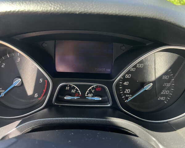 Червоний Форд Фокус, об'ємом двигуна 1.6 л та пробігом 258 тис. км за 9100 $, фото 5 на Automoto.ua