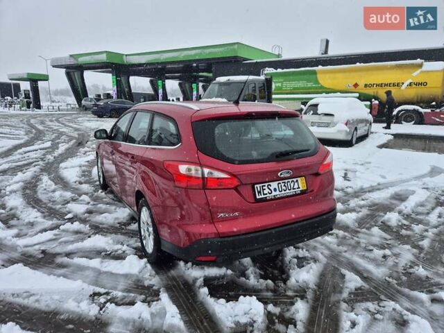 Червоний Форд Фокус, об'ємом двигуна 1.6 л та пробігом 235 тис. км за 6999 $, фото 14 на Automoto.ua