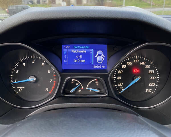 Червоний Форд Фокус, об'ємом двигуна 1.6 л та пробігом 159 тис. км за 6900 $, фото 34 на Automoto.ua