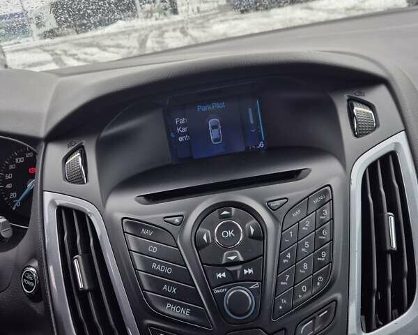 Червоний Форд Фокус, об'ємом двигуна 1.6 л та пробігом 235 тис. км за 6999 $, фото 42 на Automoto.ua