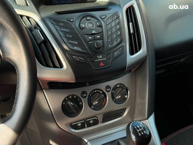 Червоний Форд Фокус, об'ємом двигуна 1.6 л та пробігом 271 тис. км за 7690 $, фото 25 на Automoto.ua