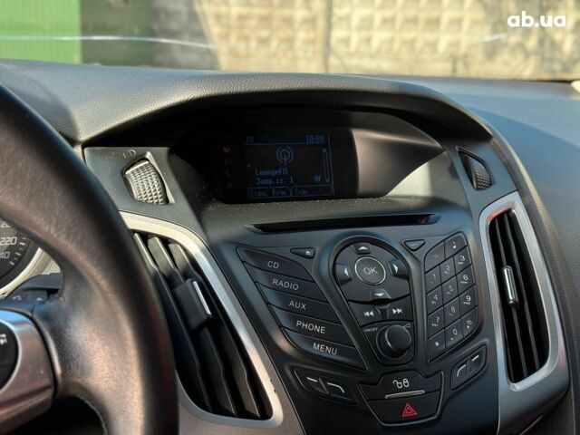 Червоний Форд Фокус, об'ємом двигуна 1.6 л та пробігом 271 тис. км за 7690 $, фото 26 на Automoto.ua