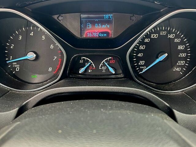 Червоний Форд Фокус, об'ємом двигуна 1 л та пробігом 168 тис. км за 6700 $, фото 6 на Automoto.ua