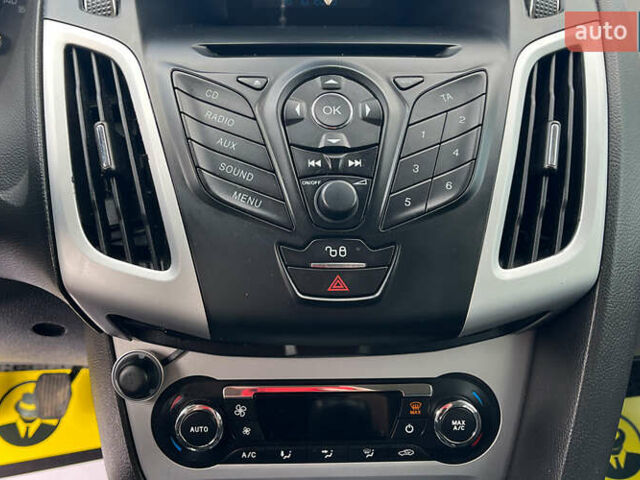 Червоний Форд Фокус, об'ємом двигуна 1.56 л та пробігом 213 тис. км за 7500 $, фото 12 на Automoto.ua