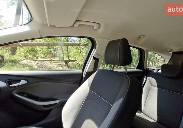Красный Форд Фокус, объемом двигателя 1.6 л и пробегом 307 тыс. км за 7500 $, фото 13 на Automoto.ua