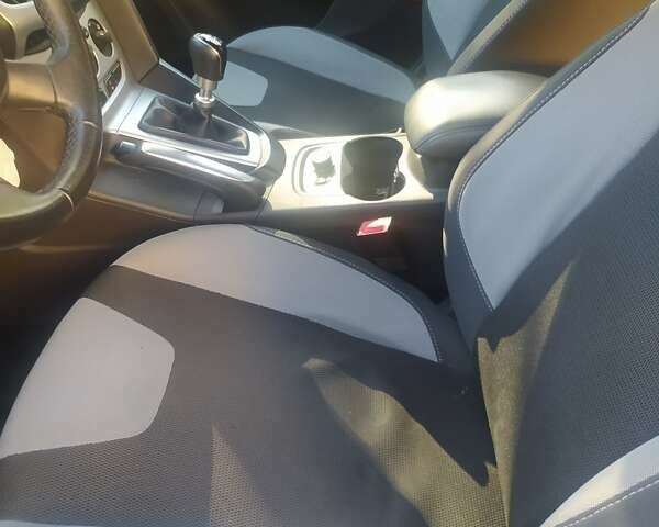 Червоний Форд Фокус, об'ємом двигуна 1.6 л та пробігом 219 тис. км за 7500 $, фото 11 на Automoto.ua