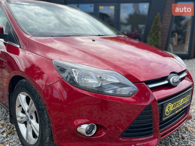 Червоний Форд Фокус, об'ємом двигуна 1.56 л та пробігом 213 тис. км за 7500 $, фото 1 на Automoto.ua
