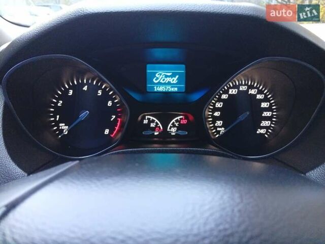 Красный Форд Фокус, объемом двигателя 1 л и пробегом 149 тыс. км за 6200 $, фото 7 на Automoto.ua