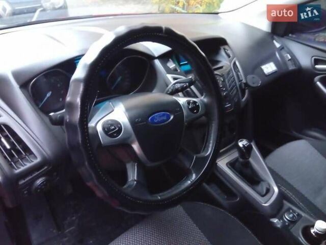 Красный Форд Фокус, объемом двигателя 1 л и пробегом 149 тыс. км за 6200 $, фото 6 на Automoto.ua