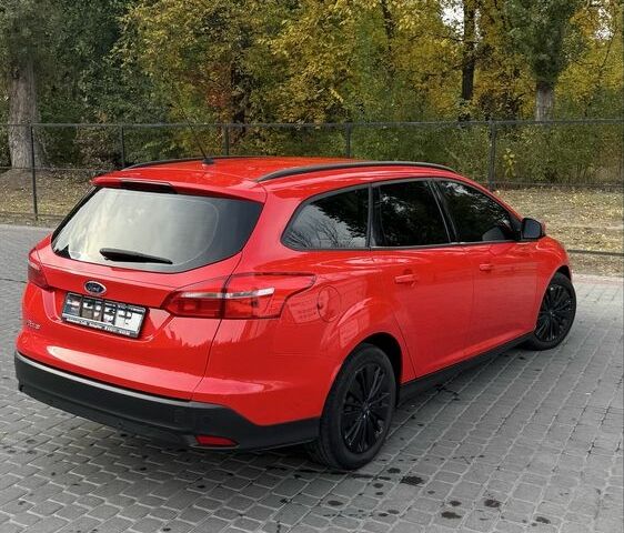Красный Форд Фокус, объемом двигателя 1.5 л и пробегом 277 тыс. км за 8750 $, фото 1 на Automoto.ua