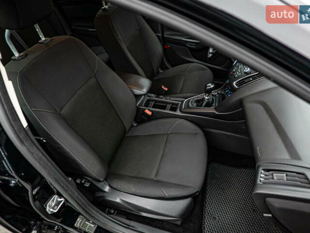 Форд Фокус, объемом двигателя 1 л и пробегом 107 тыс. км за 8016 $, фото 15 на Automoto.ua