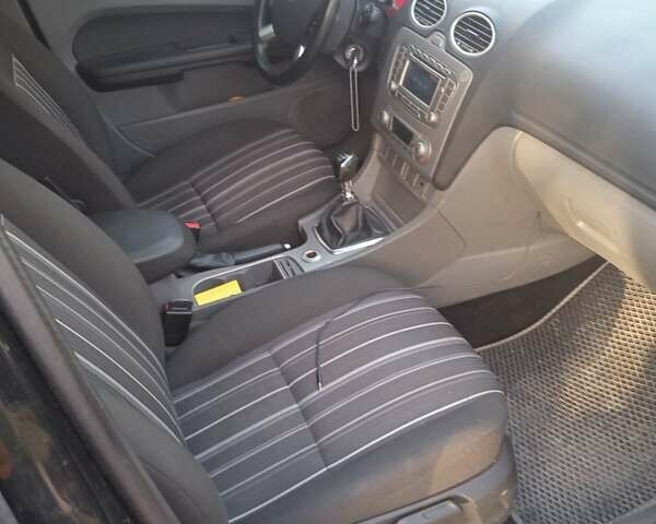 Форд Фокус, объемом двигателя 2.02 л и пробегом 260 тыс. км за 5999 $, фото 14 на Automoto.ua