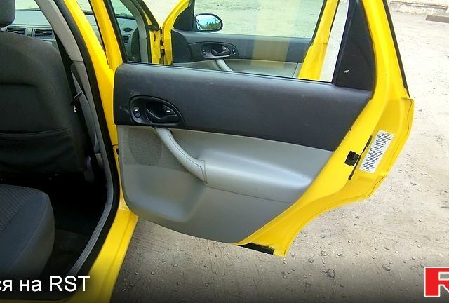 Желтый Форд Фокус, объемом двигателя 2 л и пробегом 160 тыс. км за 3200 $, фото 8 на Automoto.ua