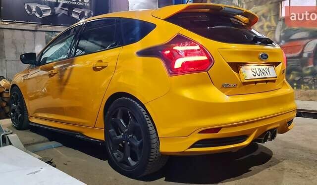 Желтый Форд Фокус, объемом двигателя 2 л и пробегом 119 тыс. км за 18000 $, фото 26 на Automoto.ua