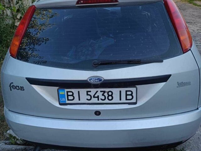 Серый Форд Фокус, объемом двигателя 1.8 л и пробегом 295 тыс. км за 2850 $, фото 2 на Automoto.ua