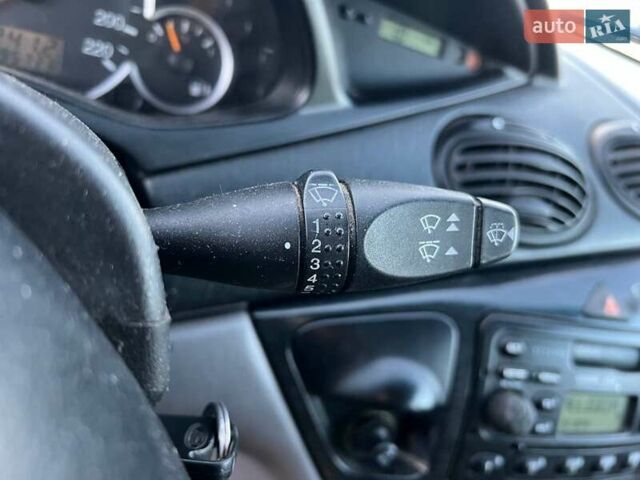 Серый Форд Фокус, объемом двигателя 1.8 л и пробегом 296 тыс. км за 2690 $, фото 21 на Automoto.ua