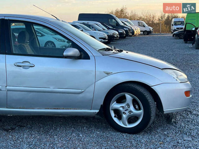 Серый Форд Фокус, объемом двигателя 1.8 л и пробегом 296 тыс. км за 2690 $, фото 10 на Automoto.ua