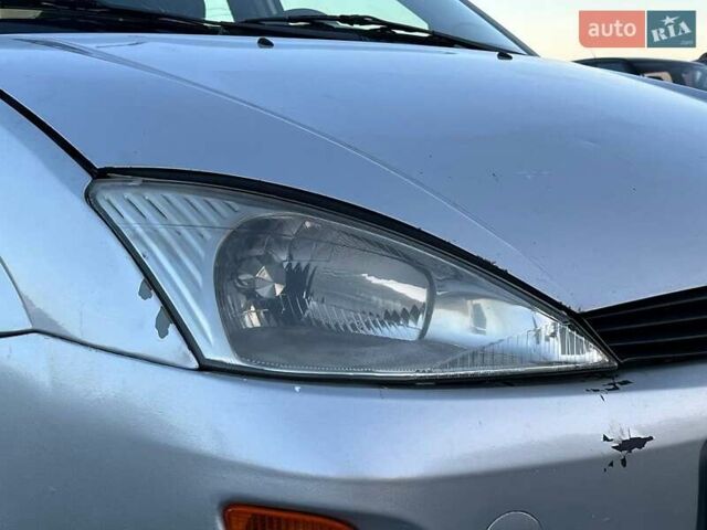 Серый Форд Фокус, объемом двигателя 1.8 л и пробегом 296 тыс. км за 2690 $, фото 12 на Automoto.ua