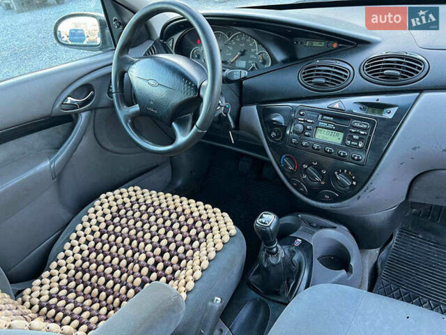 Серый Форд Фокус, объемом двигателя 1.8 л и пробегом 296 тыс. км за 2690 $, фото 35 на Automoto.ua