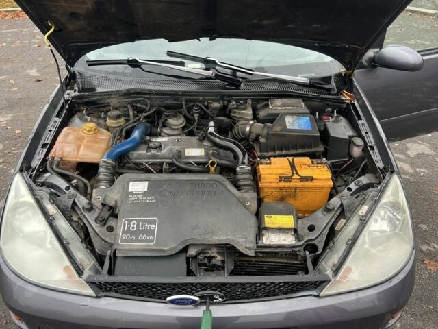 Серый Форд Фокус, объемом двигателя 1.8 л и пробегом 291 тыс. км за 2900 $, фото 5 на Automoto.ua