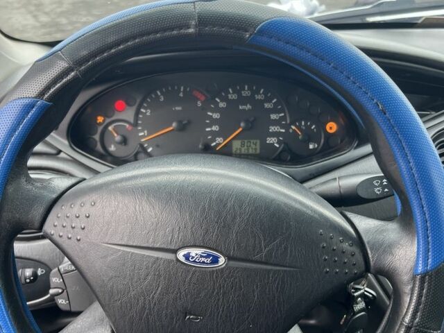 Серый Форд Фокус, объемом двигателя 1.8 л и пробегом 291 тыс. км за 2900 $, фото 4 на Automoto.ua