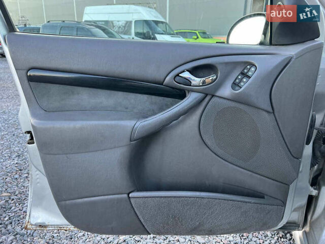 Серый Форд Фокус, объемом двигателя 1.8 л и пробегом 296 тыс. км за 2690 $, фото 14 на Automoto.ua