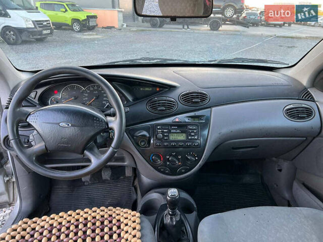 Серый Форд Фокус, объемом двигателя 1.8 л и пробегом 296 тыс. км за 2690 $, фото 32 на Automoto.ua