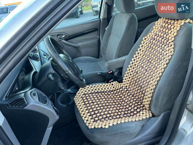 Серый Форд Фокус, объемом двигателя 1.8 л и пробегом 296 тыс. км за 2690 $, фото 17 на Automoto.ua