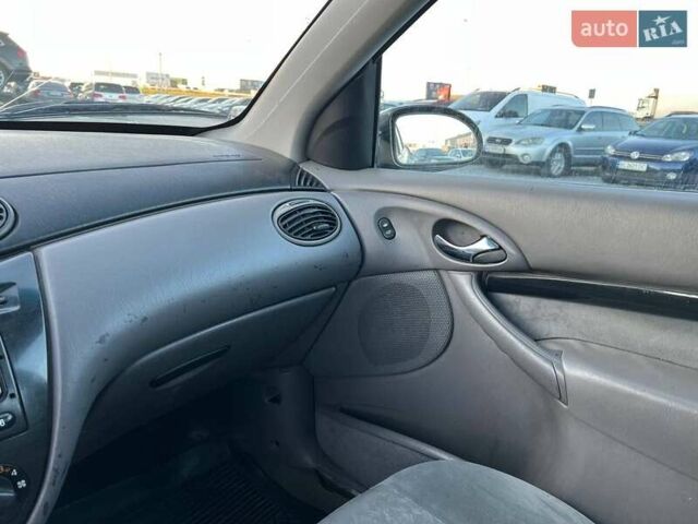Серый Форд Фокус, объемом двигателя 1.8 л и пробегом 296 тыс. км за 2690 $, фото 27 на Automoto.ua