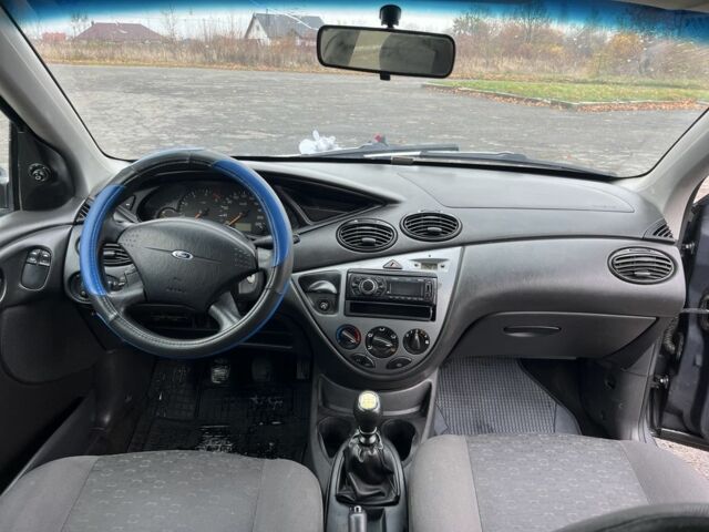 Серый Форд Фокус, объемом двигателя 1.8 л и пробегом 291 тыс. км за 2200 $, фото 4 на Automoto.ua