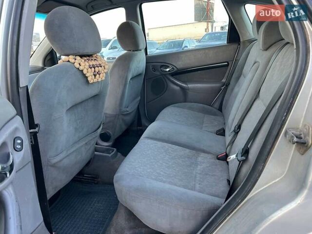 Серый Форд Фокус, объемом двигателя 1.8 л и пробегом 296 тыс. км за 2690 $, фото 31 на Automoto.ua