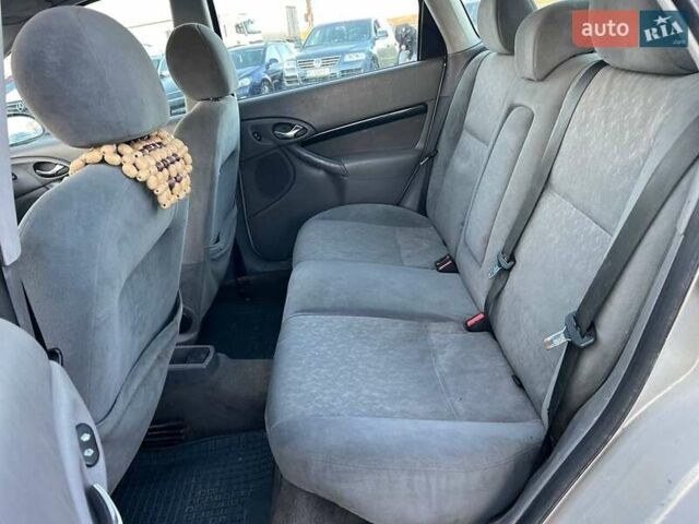 Серый Форд Фокус, объемом двигателя 1.8 л и пробегом 296 тыс. км за 2690 $, фото 30 на Automoto.ua