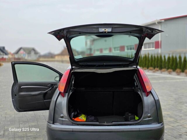 Серый Форд Фокус, объемом двигателя 1.8 л и пробегом 275 тыс. км за 1999 $, фото 23 на Automoto.ua