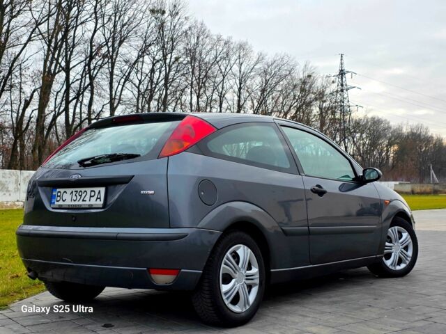 Серый Форд Фокус, объемом двигателя 1.8 л и пробегом 275 тыс. км за 1999 $, фото 4 на Automoto.ua