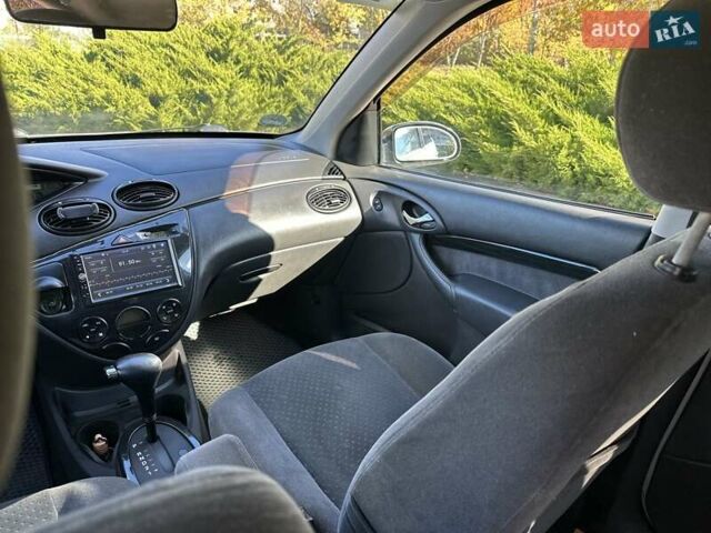 Серый Форд Фокус, объемом двигателя 1.6 л и пробегом 168 тыс. км за 4500 $, фото 9 на Automoto.ua