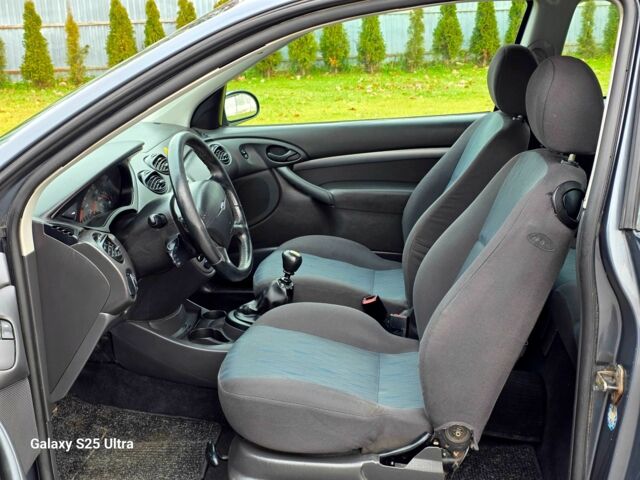 Серый Форд Фокус, объемом двигателя 1.8 л и пробегом 275 тыс. км за 1999 $, фото 21 на Automoto.ua