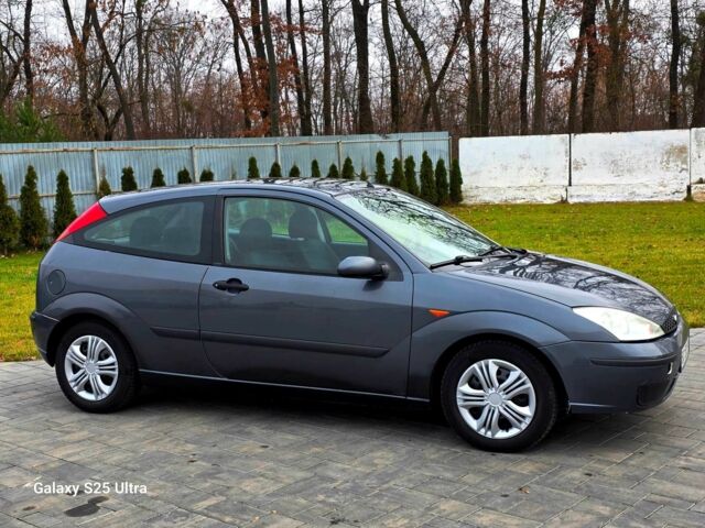 Серый Форд Фокус, объемом двигателя 1.8 л и пробегом 275 тыс. км за 1999 $, фото 2 на Automoto.ua