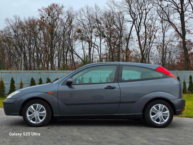 Серый Форд Фокус, объемом двигателя 1.8 л и пробегом 275 тыс. км за 1999 $, фото 14 на Automoto.ua