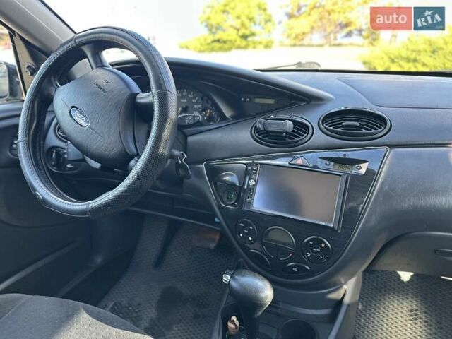 Серый Форд Фокус, объемом двигателя 1.6 л и пробегом 168 тыс. км за 4500 $, фото 8 на Automoto.ua