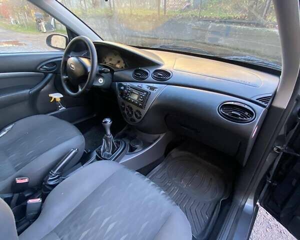 Серый Форд Фокус, объемом двигателя 1.8 л и пробегом 327 тыс. км за 3500 $, фото 12 на Automoto.ua