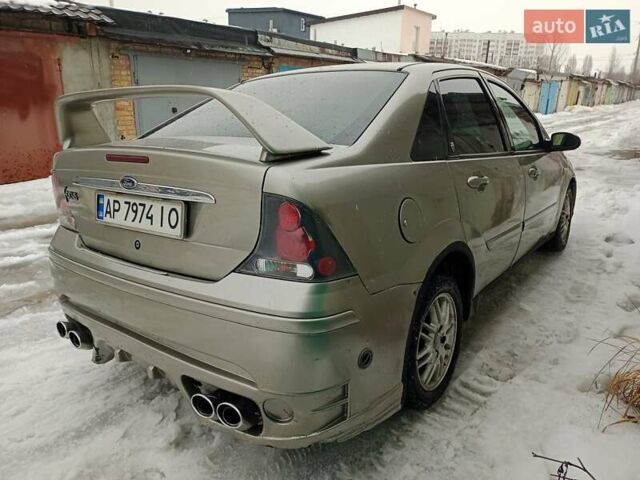 Серый Форд Фокус, объемом двигателя 1.7 л и пробегом 417 тыс. км за 2400 $, фото 11 на Automoto.ua