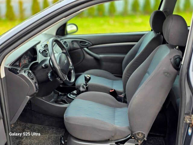 Серый Форд Фокус, объемом двигателя 1.8 л и пробегом 275 тыс. км за 1999 $, фото 20 на Automoto.ua